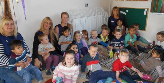 Playgroup children and staff with one of our new heaters